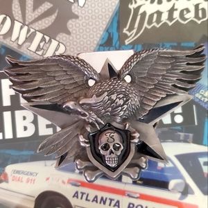 Eagle holding a Skull Shield belt buckle with lighter **